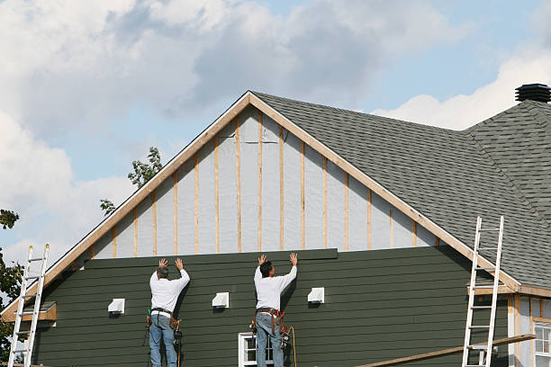 Professional Siding technician working in Springfield, OH